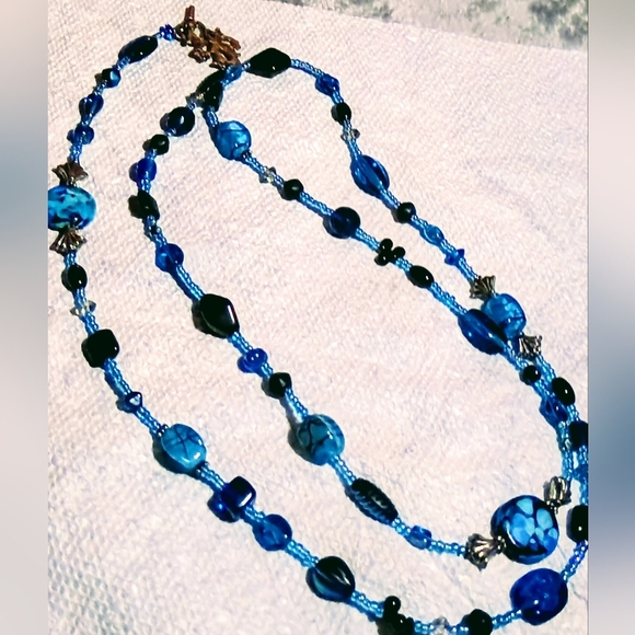 Unbranded Jewelry - VINTAGE BLUE & BLACK BEADED NECKLACE WITH GOLD BROOCH CLOSURE ARTSY BOHO WHIMSY